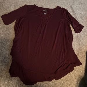 AE maroon top with crisscross detail at the neck size small runs a little big